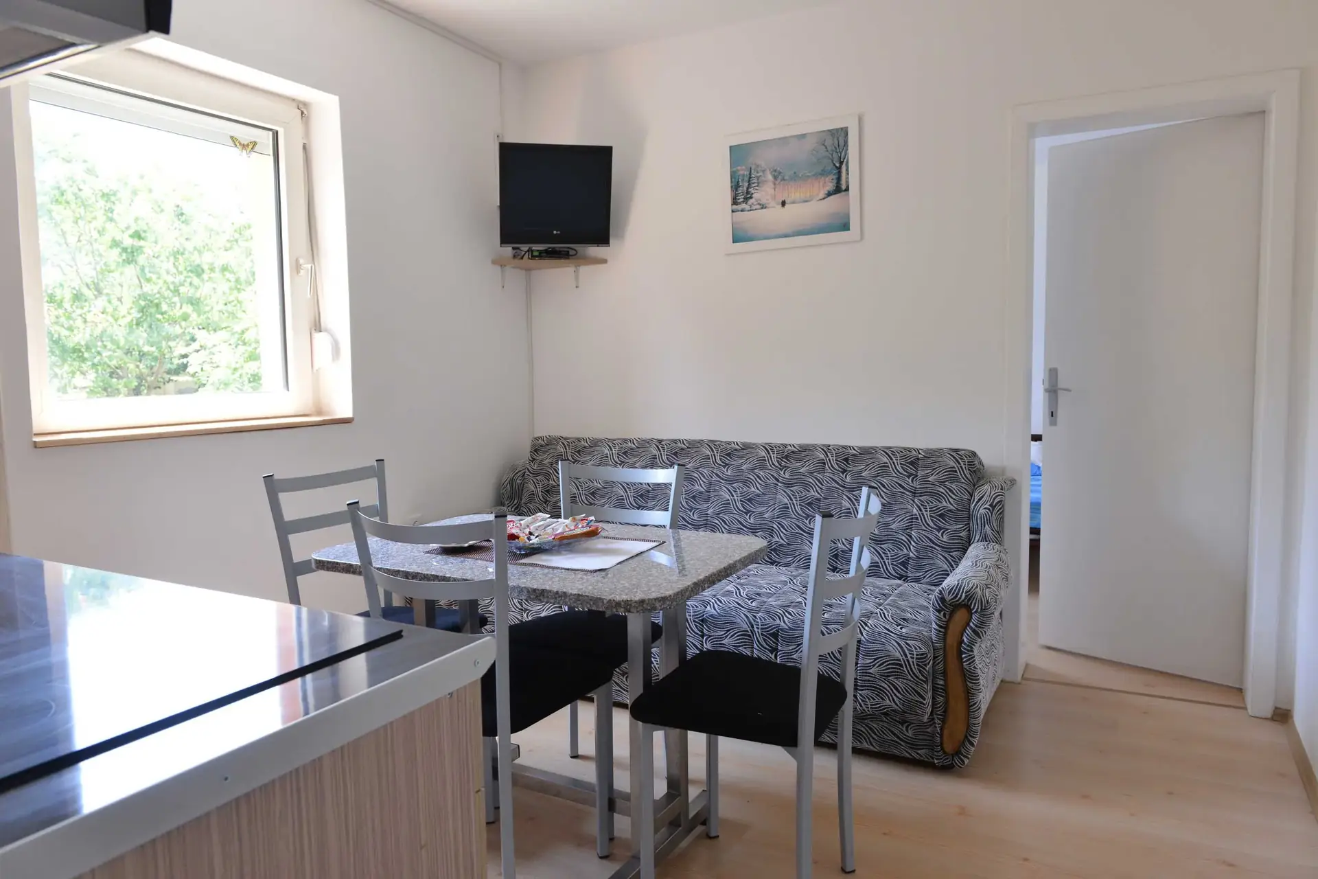 Apartmani LOLA two-bedroom apartment living area